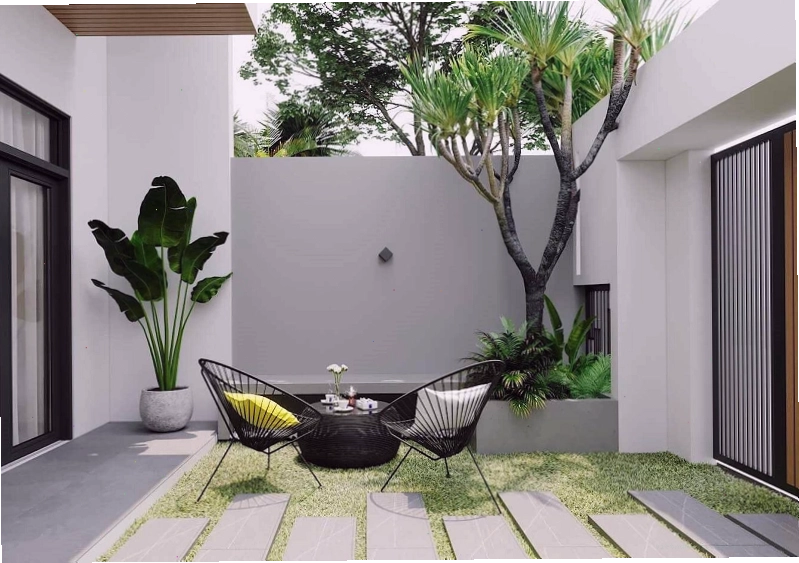 Thiết kế sân vườn trước nhà ống với lối đi nhỏ và cây xanh tươi mát